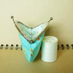 Small Metal Frame Blue Pouc..